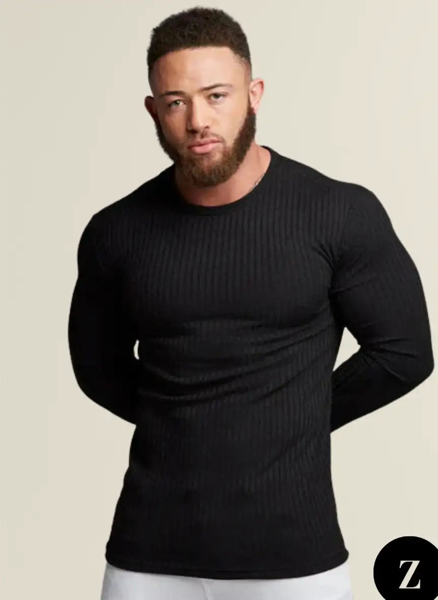 Black ribbed long-sleeve muscle shirt with a crew neck.